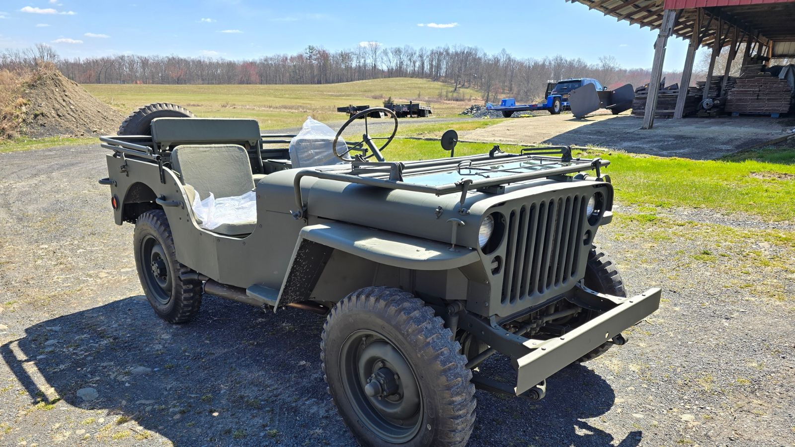 Unmarked WW2 Jeep in olive drab paint before historical livery applied
